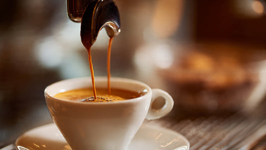 Espresso shot brewing African Espresso Blend coffee.