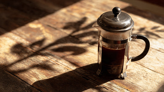 French press brewing Asian Plateau Blend coffee.