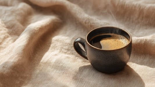 Brazil Santos single origin coffee in ceramic cup with warm nutty tones and elegant editorial lighting