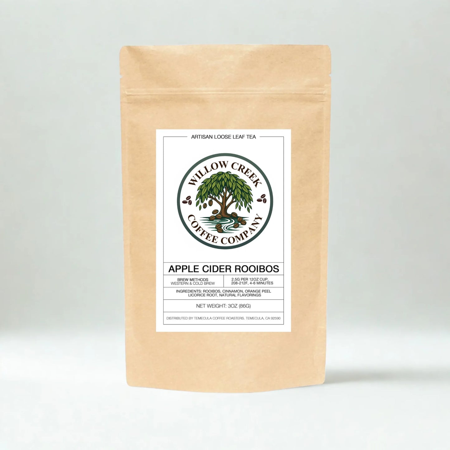 Kraft paper tea bag of Apple Cider Rooibos Tea with Willow Creek Coffee Company label on a light gray background