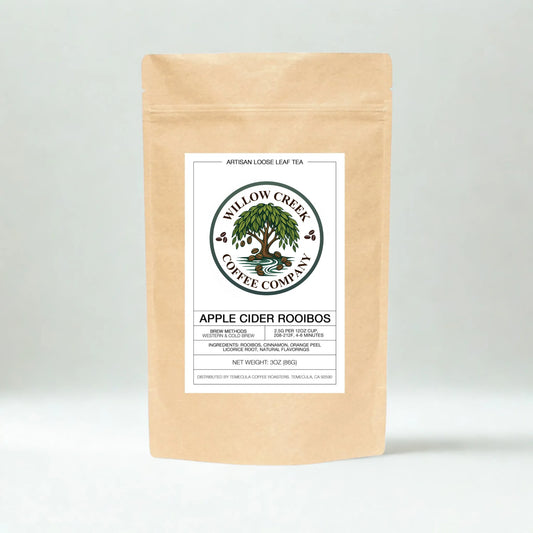 Kraft paper tea bag of Apple Cider Rooibos Tea with Willow Creek Coffee Company label on a light gray background