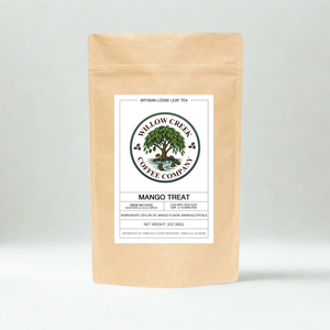 Mango Treat tea product display showing premium tropical fruit loose leaf tea packaging
