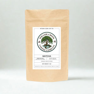 Kraft paper matcha tea package with Willow Creek Coffee Company label on a light gray background