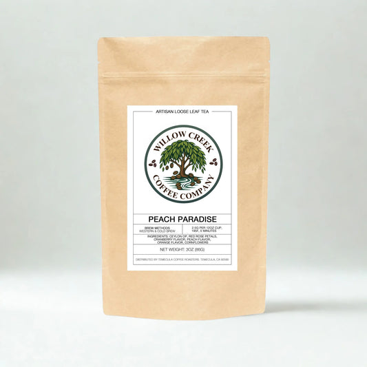 Kraft paper Peach Paradice tea bag with Willow Creek Coffee Company label on a light gray background