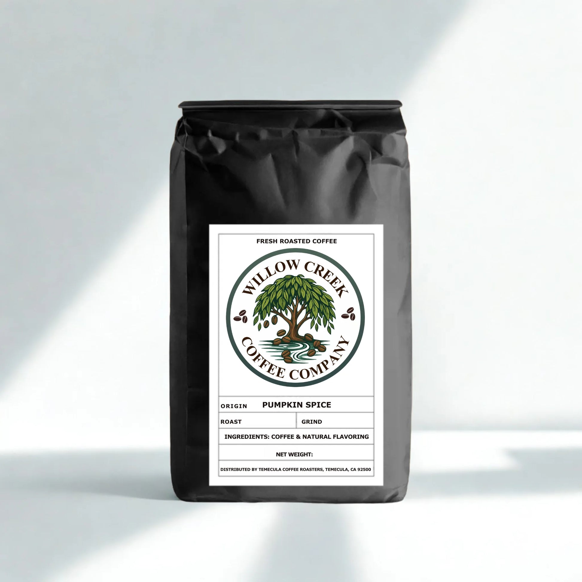 Pumpkin Spice Coffee bag from Willow Creek Coffee Company on a light gray background